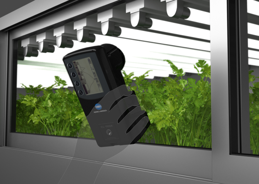 The instrument being used to control illuminance and measure photosynthetic photon flux density (PPFD) at a plant factory