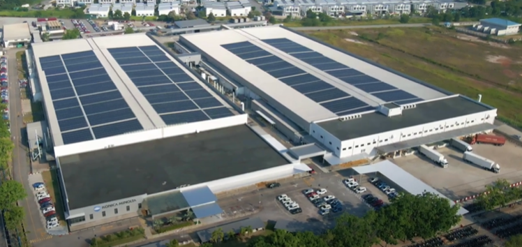 Aerial photograph of the Konica Minolta Business Technologies (Malaysia) plant, its roof covered with solar panels