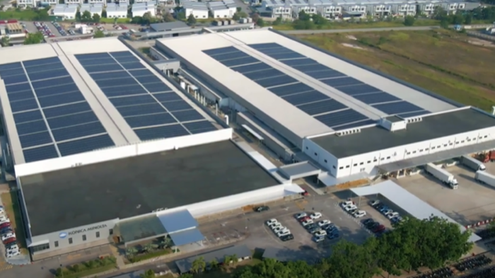 Aerial photograph of the Konica Minolta Business Technologies (Malaysia) plant, with solar panels laid across the roof