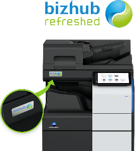 Close-up of the “bizhub refreshed” label affixed beside the control panel of a multifunctional peripheral