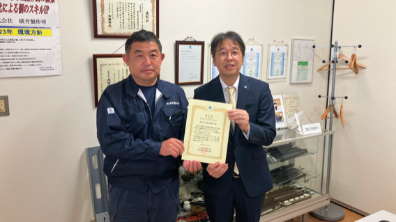A certificate being presented