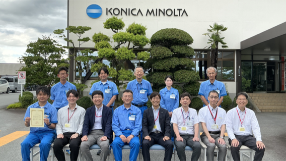 Group photograph taken at an achievement review meeting