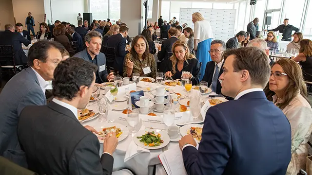 Participants in discussion around a round table at the United Nations Global Compact Private Sector Forum